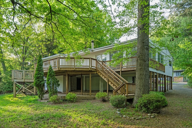 16 Wakerobin Rd, Norwalk, CT 06851 - back of house with stairway and a deck