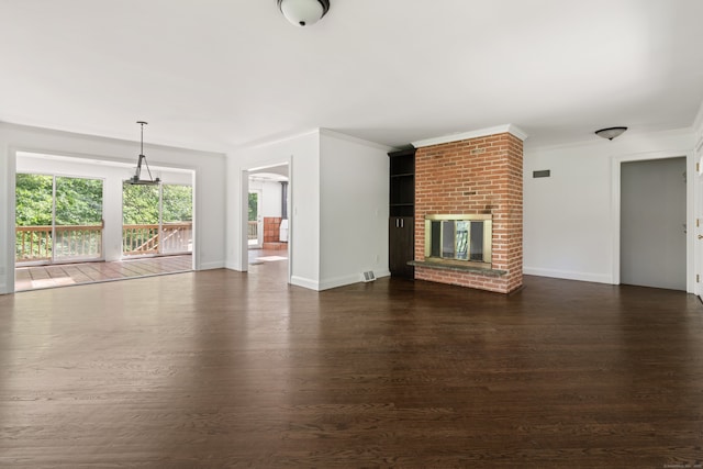 16 Wakerobin Rd, Norwalk, CT 06851 - unfurnished living room with dark wood-type flooring, a fireplace, ornamental molding, and baseboards