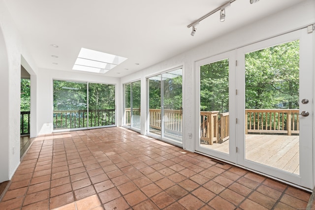 16 Wakerobin Rd, Norwalk, CT 06851 - unfurnished sunroom featuring a skylight and plenty of natural light