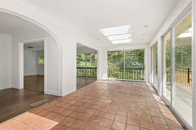16 Wakerobin Rd, Norwalk, CT 06851 - unfurnished sunroom with a skylight