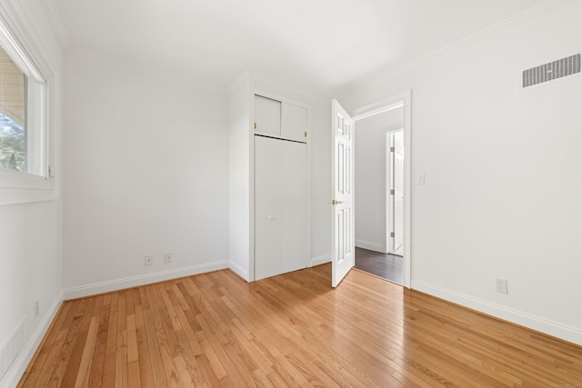 16 Wakerobin Rd, Norwalk, CT 06851 - unfurnished bedroom featuring light wood-type flooring, ornamental molding, and baseboards