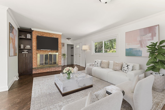 16 Wakerobin Rd, Norwalk, CT 06851 - living room with crown molding, dark wood-type flooring, baseboards, and a brick fireplace