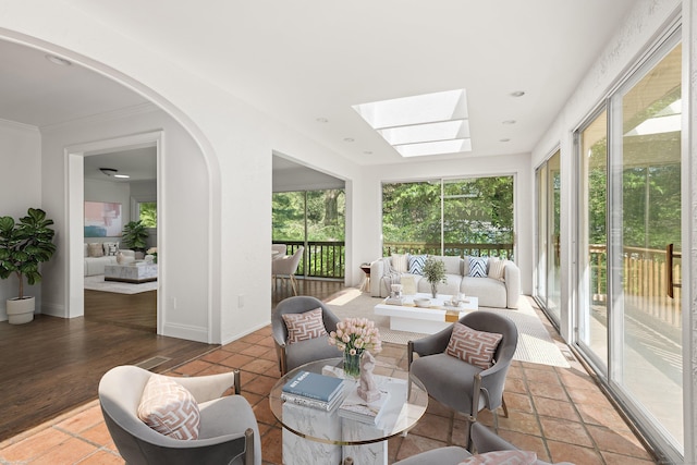16 Wakerobin Rd, Norwalk, CT 06851 - sunroom featuring a skylight, recessed lighting, and ornamental molding