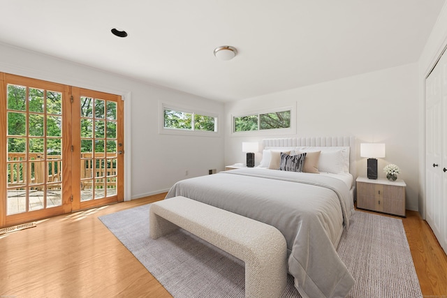 16 Wakerobin Rd, Norwalk, CT 06851 - bedroom with access to outside, light wood finished floors, baseboards, and a closet