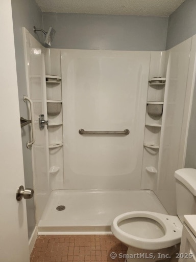 58 Evergreene Unit 58, Wallingford, CT 06492 - bathroom with toilet and a stall shower