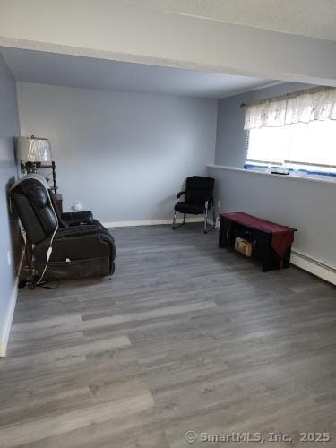 58 Evergreene Unit 58, Wallingford, CT 06492 - unfurnished room with wood finished floors and baseboards