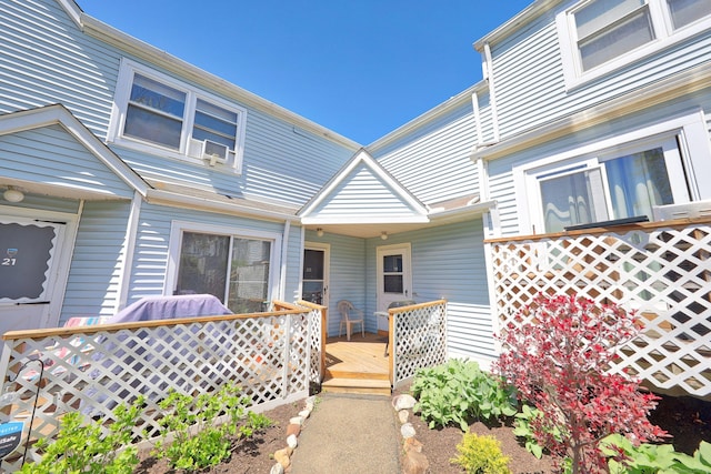 exterior space featuring a wooden deck