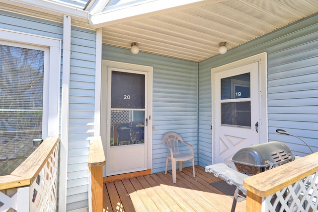 wooden deck featuring grilling area