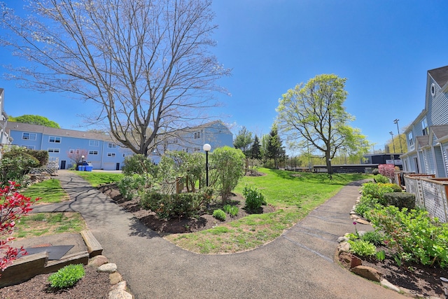 view of yard featuring a residential view