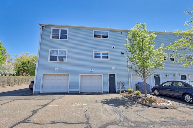 view of front of property with an attached garage and driveway