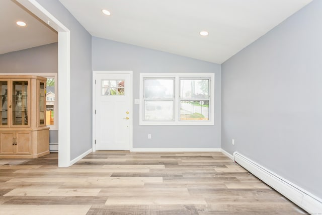 75 Edwards St, Bridgeport, CT 06606 - entryway with baseboard heating, vaulted ceiling, baseboards, recessed lighting, and light wood-style floors