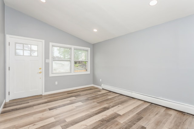 75 Edwards St, Bridgeport, CT 06606 - entrance foyer with a baseboard radiator, vaulted ceiling, recessed lighting, light wood-style flooring, and baseboards