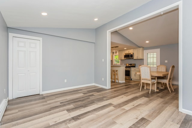 75 Edwards St, Bridgeport, CT 06606 - dining room with lofted ceiling, light wood-style floors, baseboards, and recessed lighting