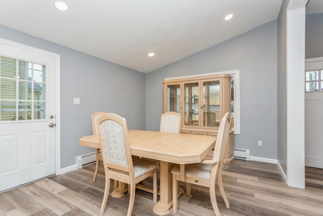 75 Edwards St, Bridgeport, CT 06606 - dining area featuring lofted ceiling, light wood-style flooring, recessed lighting, baseboard heating, and baseboards