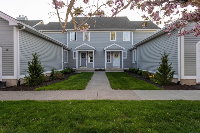 view of front of property with a front yard