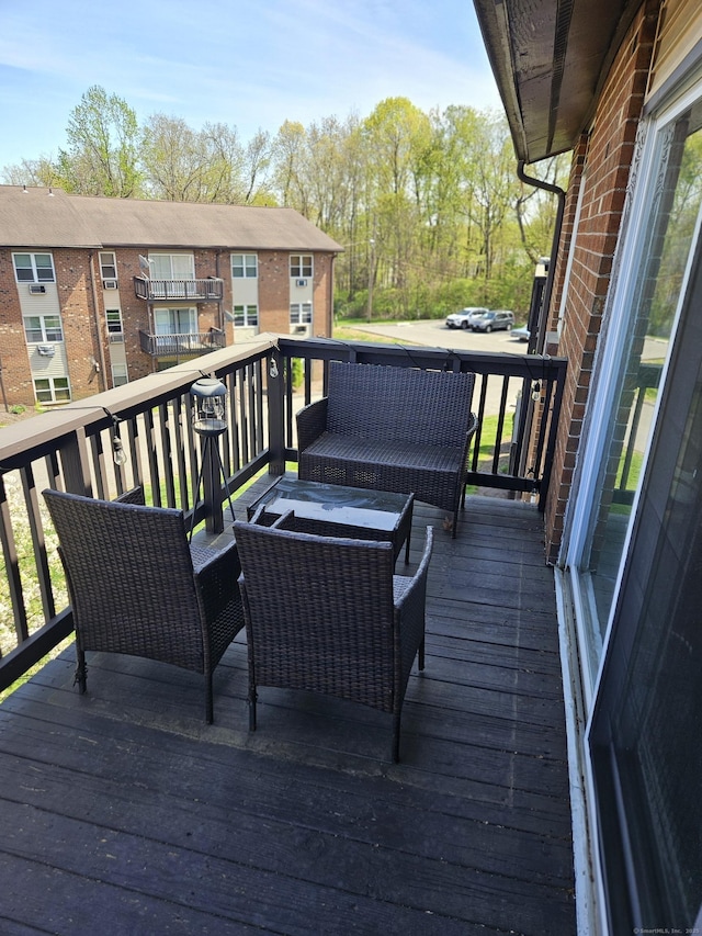 deck featuring outdoor lounge area