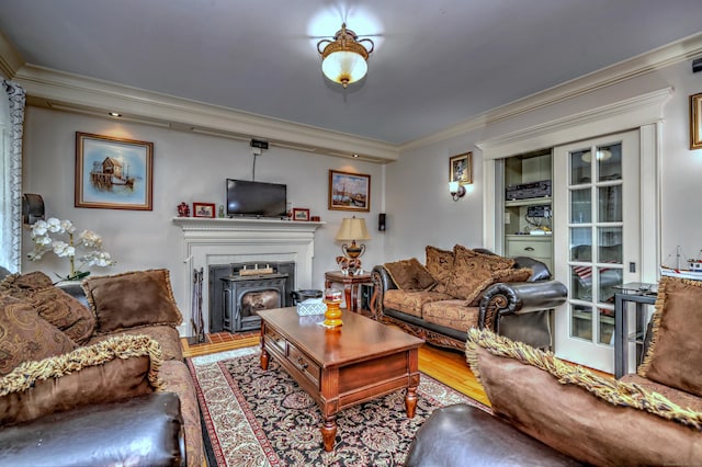 1440 Straits Tpke, Middlebury, CT 06762 - living area with ornamental molding, wood finished floors, and a wood stove
