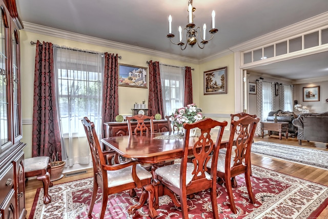 1440 Straits Tpke, Middlebury, CT 06762 - dining area featuring visible vents, ornamental molding, wood finished floors, and a chandelier