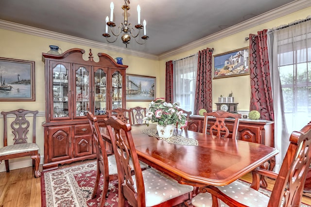 1440 Straits Tpke, Middlebury, CT 06762 - dining space featuring ornamental molding, light wood finished floors, and a chandelier