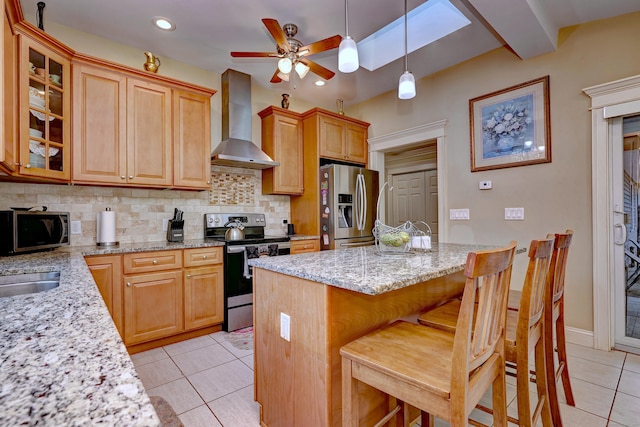 1440 Straits Tpke, Middlebury, CT 06762 - kitchen featuring light stone countertops, wall chimney exhaust hood, stainless steel appliances, light tile patterned floors, and tasteful backsplash