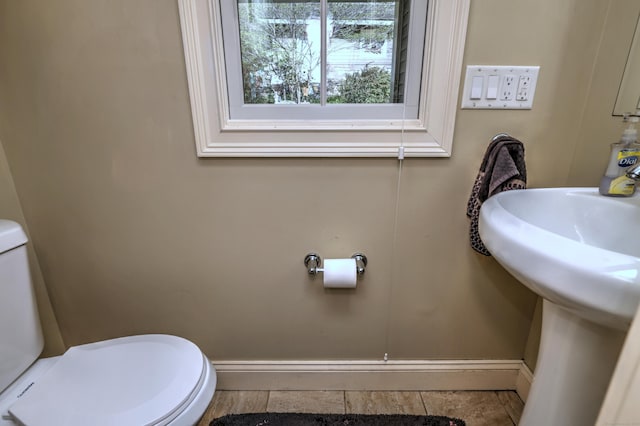1440 Straits Tpke, Middlebury, CT 06762 - half bath with toilet, baseboards, and tile patterned floors