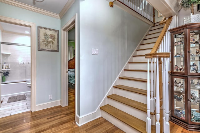 1440 Straits Tpke, Middlebury, CT 06762 - staircase featuring baseboards, ornamental molding, and wood finished floors