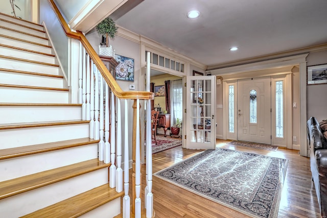 1440 Straits Tpke, Middlebury, CT 06762 - entrance foyer featuring crown molding, recessed lighting, wood finished floors, and stairway