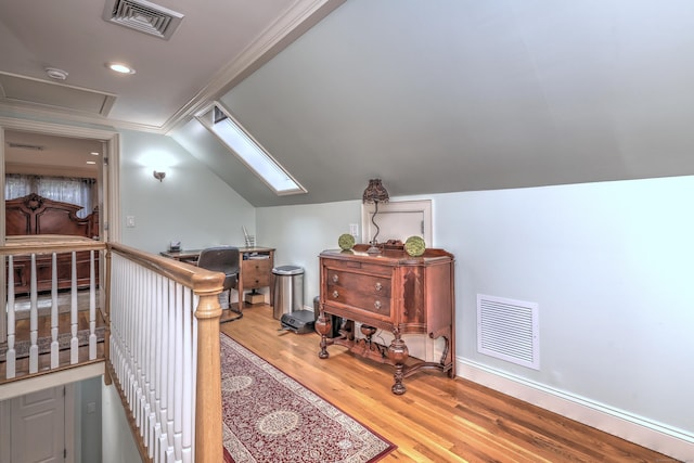 1440 Straits Tpke, Middlebury, CT 06762 - additional living space featuring baseboards, visible vents, wood finished floors, and lofted ceiling with skylight