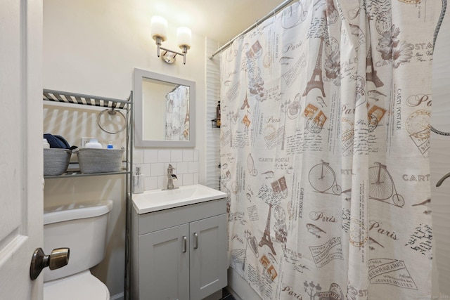 38 Broad St, Plainville, CT 06062 - bathroom featuring backsplash, vanity, toilet, and a shower with shower curtain