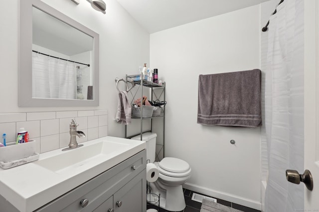 38 Broad St, Plainville, CT 06062 - bathroom featuring tasteful backsplash, a shower with shower curtain, tile patterned flooring, toilet, and vanity