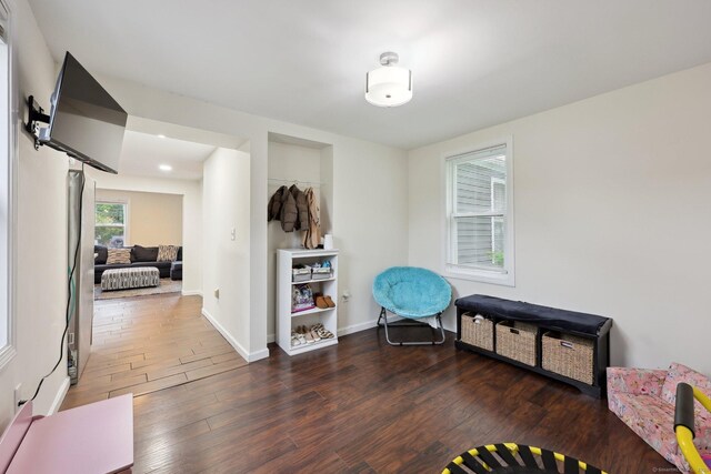 38 Broad St, Plainville, CT 06062 - living area featuring wood finished floors, baseboards, and recessed lighting
