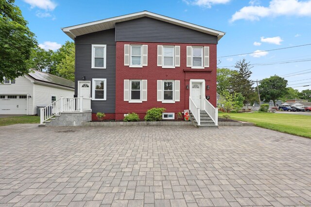 38 Broad St, Plainville, CT 06062 - view of front of property featuring brick siding and entry steps