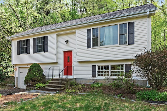 split foyer home featuring an attached garage
