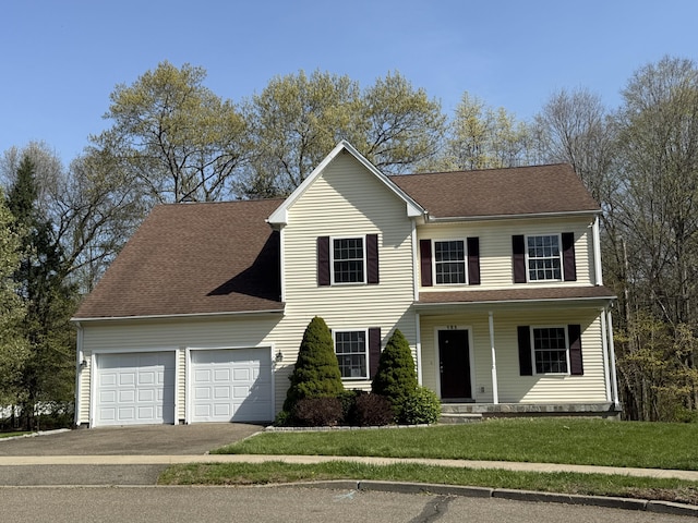 123 Hidden Valley Dr, Meriden, CT 06451 - traditional home with a shingled roof, an attached garage, a front lawn, covered porch, and driveway