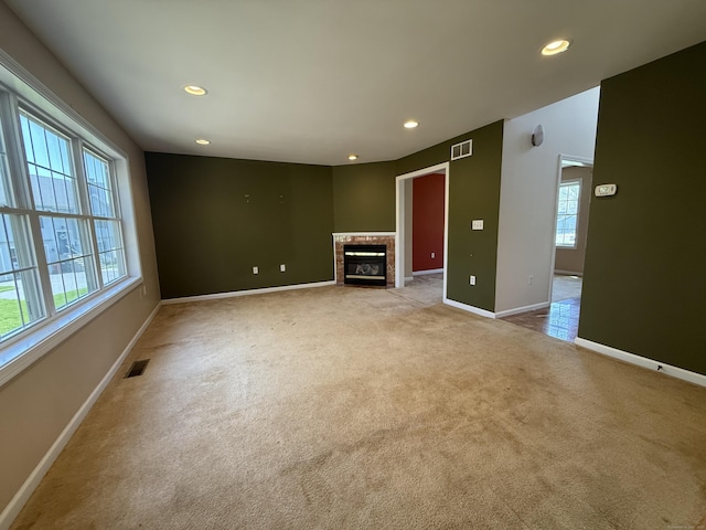 123 Hidden Valley Dr, Meriden, CT 06451 - unfurnished living room with visible vents and light carpet
