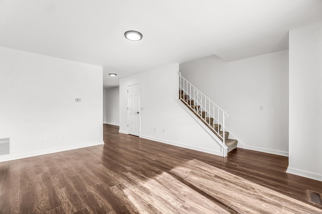15 Crest St Unit D27, West Haven, CT 06516 - unfurnished living room featuring baseboards, stairs, wood finished floors, and visible vents