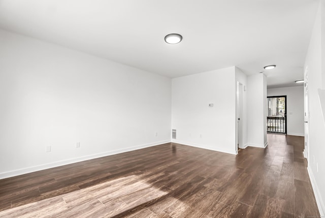 15 Crest St Unit D27, West Haven, CT 06516 - spare room with baseboards, visible vents, and dark wood-type flooring