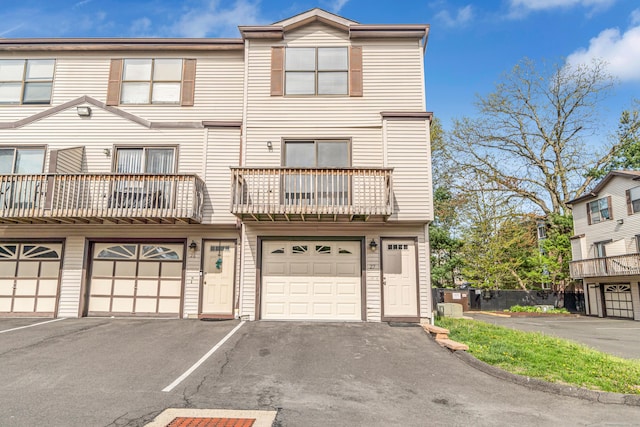 15 Crest St Unit D27, West Haven, CT 06516 - multi unit property with an attached garage, driveway, and a balcony