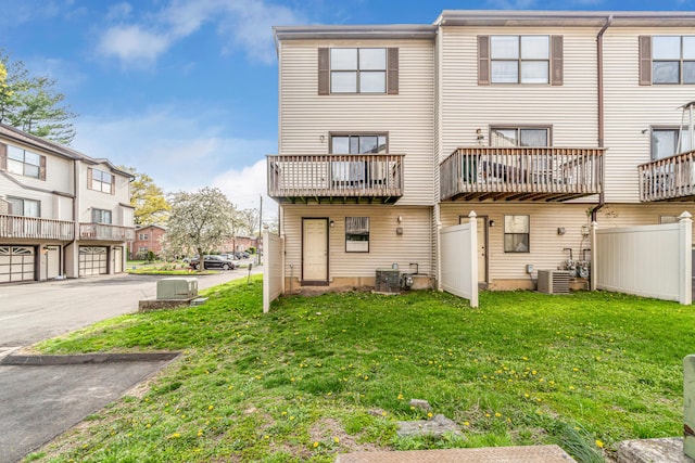 15 Crest St Unit D27, West Haven, CT 06516 - rear view of property with a lawn, cooling unit, a residential view, and driveway