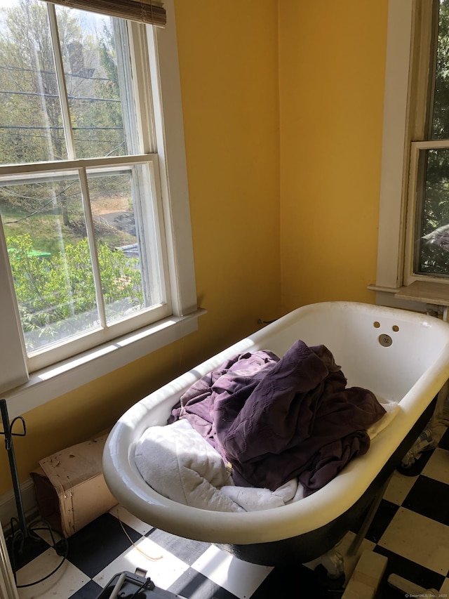 bedroom featuring multiple windows