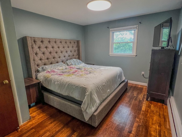 63 Ridgetop Rd, Wallingford, CT 06492 - bedroom with a baseboard heating unit, dark wood finished floors, and baseboards