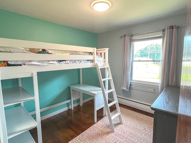 63 Ridgetop Rd, Wallingford, CT 06492 - bedroom with wood finished floors, a baseboard heating unit, and baseboards