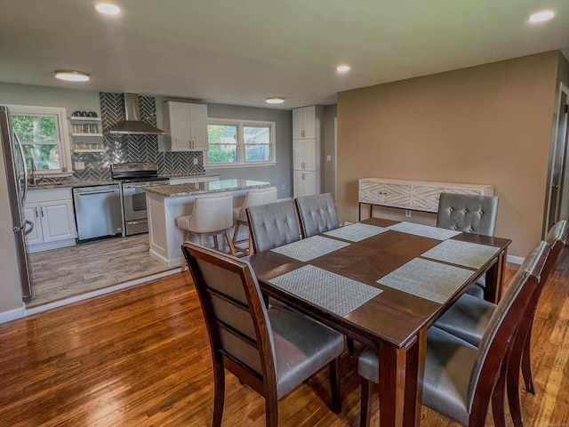 63 Ridgetop Rd, Wallingford, CT 06492 - dining space with light wood finished floors and recessed lighting