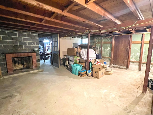 63 Ridgetop Rd, Wallingford, CT 06492 - basement featuring a brick fireplace