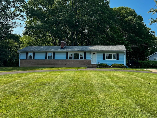 63 Ridgetop Rd, Wallingford, CT 06492 - single story home with brick siding, a front yard, a chimney, and entry steps