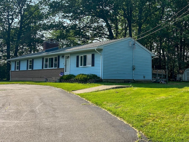 63 Ridgetop Rd, Wallingford, CT 06492 - ranch-style house featuring a front yard and a chimney