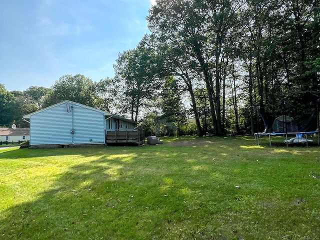 63 Ridgetop Rd, Wallingford, CT 06492 - view of green lawn featuring a trampoline