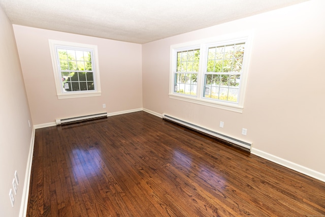 144 Fiesta Hts, Meriden, CT 06451 - unfurnished room with a baseboard radiator, healthy amount of natural light, and dark wood finished floors