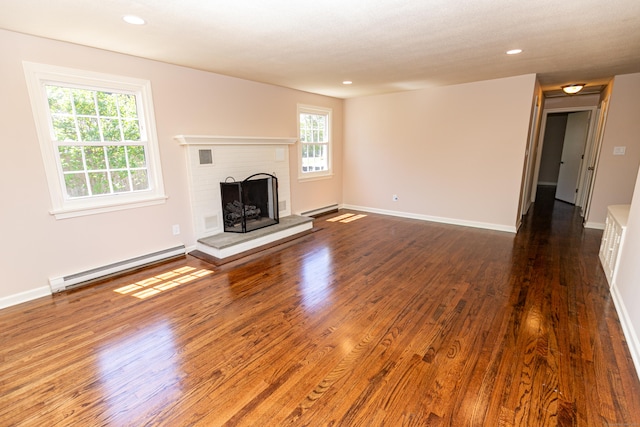 144 Fiesta Hts, Meriden, CT 06451 - unfurnished living room with a baseboard radiator, a fireplace, wood finished floors, a baseboard heating unit, and baseboards