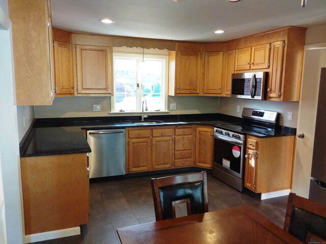 144 Fiesta Hts, Meriden, CT 06451 - kitchen featuring appliances with stainless steel finishes, a sink, dark countertops, and recessed lighting